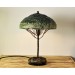 Metal table lamp with a ceramic shade and stone stand