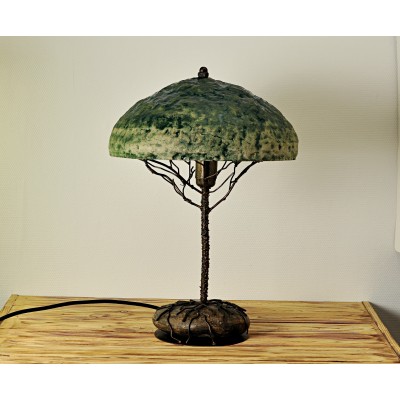 Metal table lamp with a stone stand