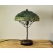 Metal table lamp with a ceramic shade and stone stand