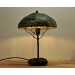Metal table lamp with a ceramic shade and stone stand