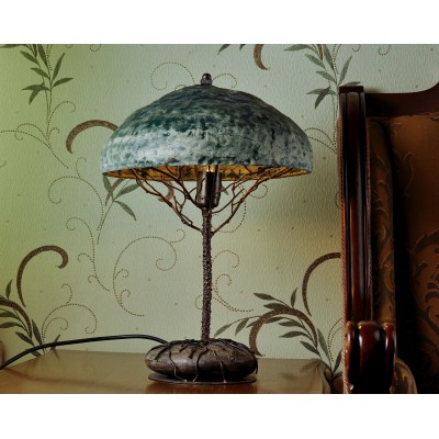 Metal table lamp with a stone stand