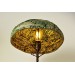 Metal table lamp with a ceramic shade and stone stand