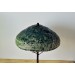 Metal table lamp with a ceramic shade and stone stand