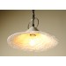 Handmade ceramic lamp in a rustic style hanging on a metal chain 