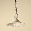 Handmade ceramic lamp in a rustic style hanging on a metal chain 