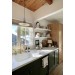 Handmade ceramic lamp in a rustic style hanging on a metal chain 