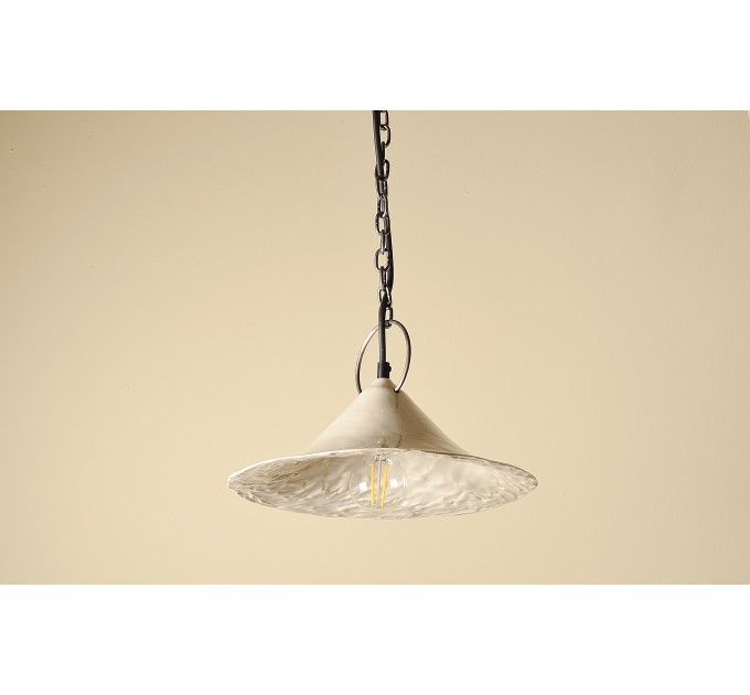 Handmade ceramic lamp in a rustic style hanging on a metal chain 